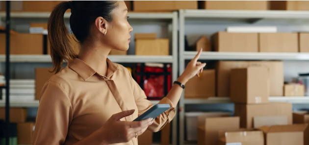 Team member managing inventory in the IBEX warehouse